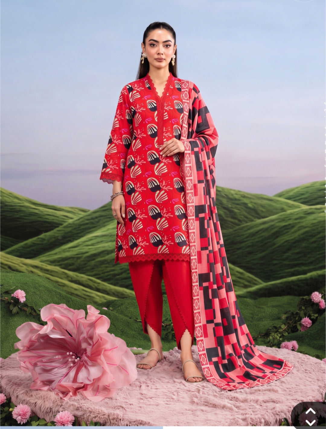 Ruby Red Dhanak 3-Piece Suit worn by a model in a scenic outdoor setting with a pink flower accent.